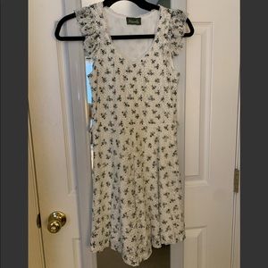 White Lace Dress with Black Floral Detailing